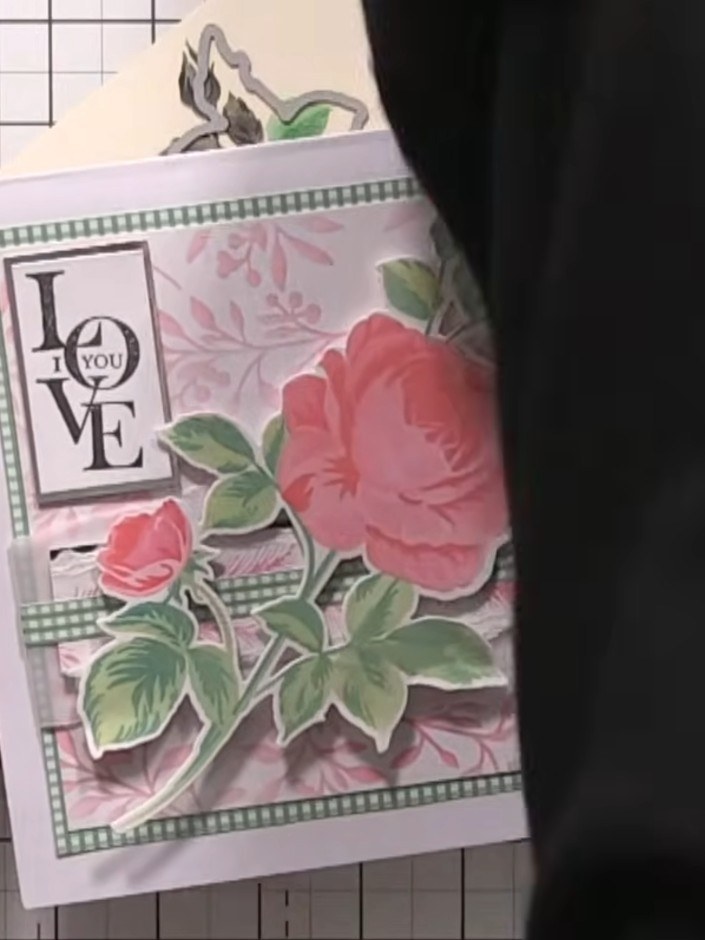 Step 12: Mount the completed die-cut rose design onto your card base. Position it centrally and secure with adhesive. Y