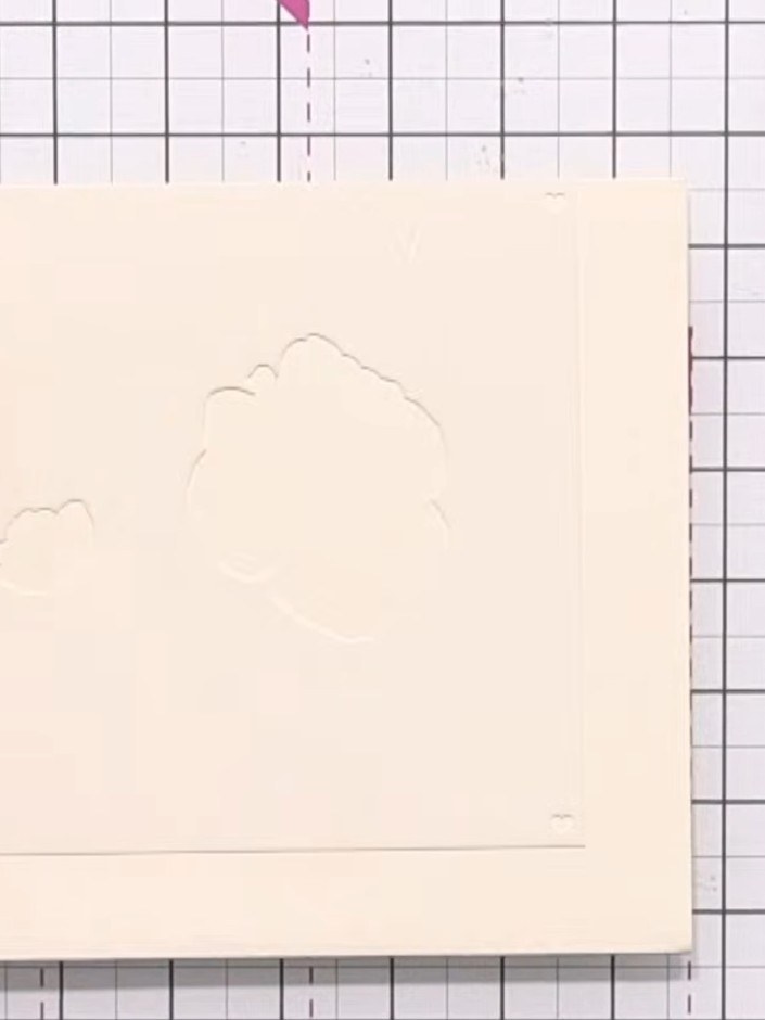 Step 6: Using the first layer stencil, apply yellow or orange ink to the right side of the card (the coloured half). U