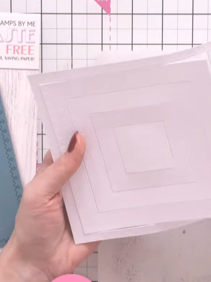 Step 6: For a deeper embossed effect, use a shim by placing extra card underneath the die when running it through your