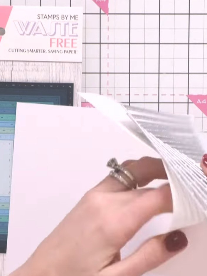 Step 3: Run the card and dies through your die cutting machine in one pass. The dies are positioned on the white card 