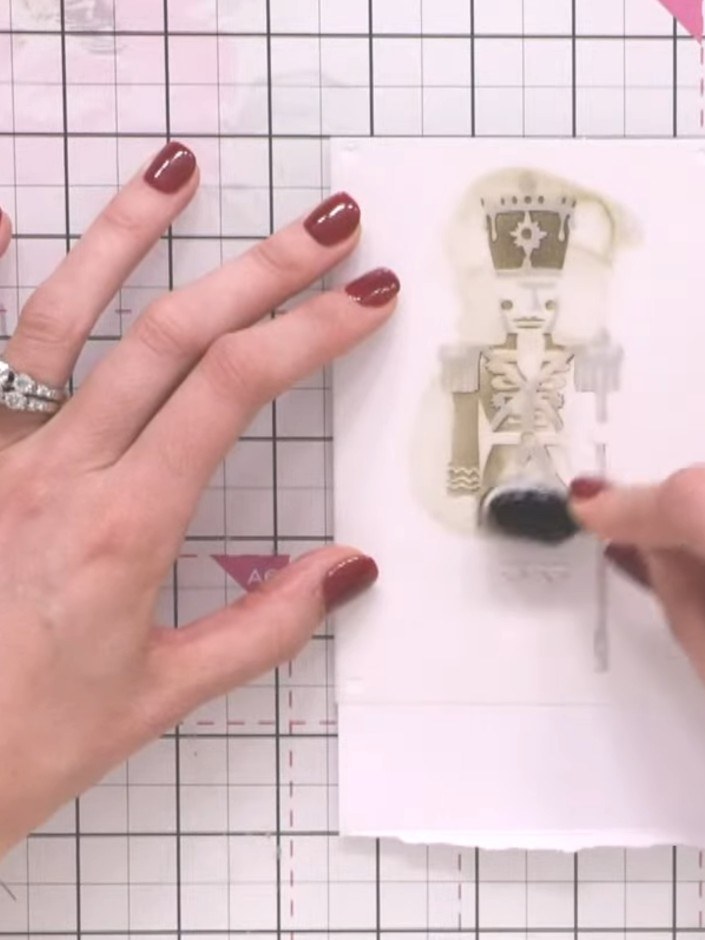 Step 5: Continue layering the stencils, applying each numbered layer in sequence to build up the complete General Ches