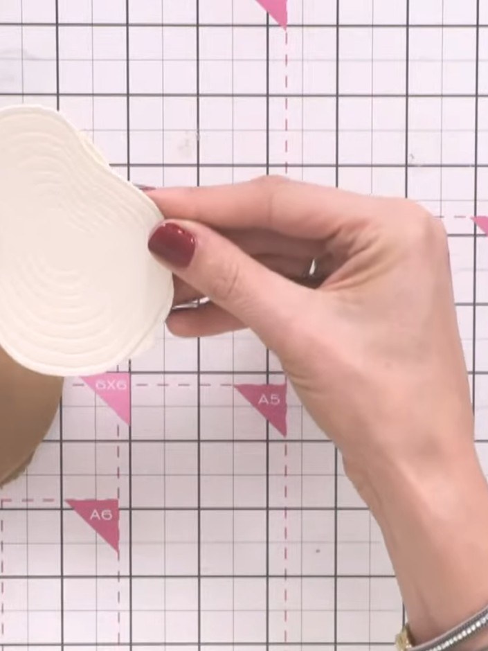 Step 1: Select the oak slice die and ink it up with your chosen ink colour using an ink pad, ensuring even coverage ac