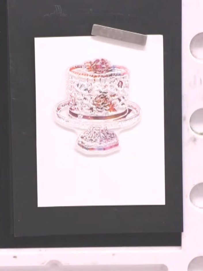 Step 7: Stamp the cake image again in teal ink onto the white card. Stamp twice if needed for better visibility and co