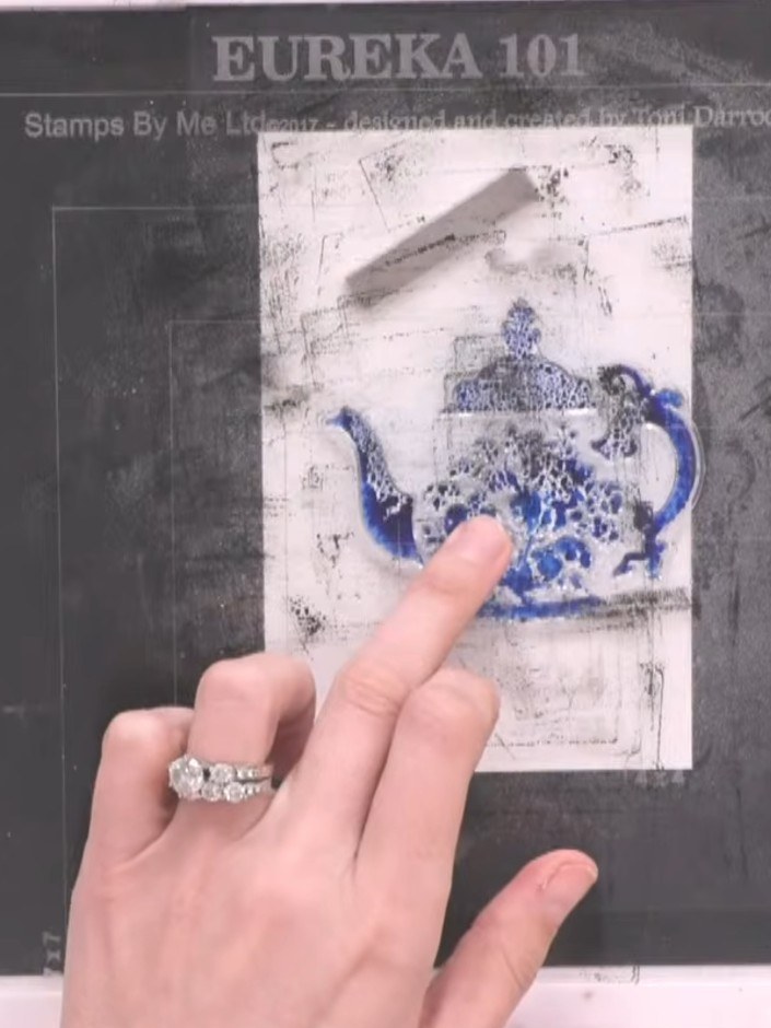 Step 3: Stamp the solid teapot image onto the watercolour card, pressing down firmly and evenly to ensure good coverag