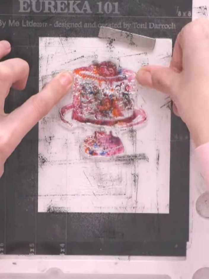 Step 5: Allow the watercolour card to settle for a moment. Use a dry wipe or cloth to gently blot away any excess wate