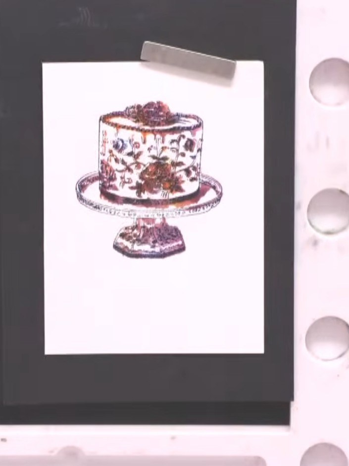 Step 8: If the stamped detail is not sufficiently visible, stamp the detail layer a second time using a darker ink col