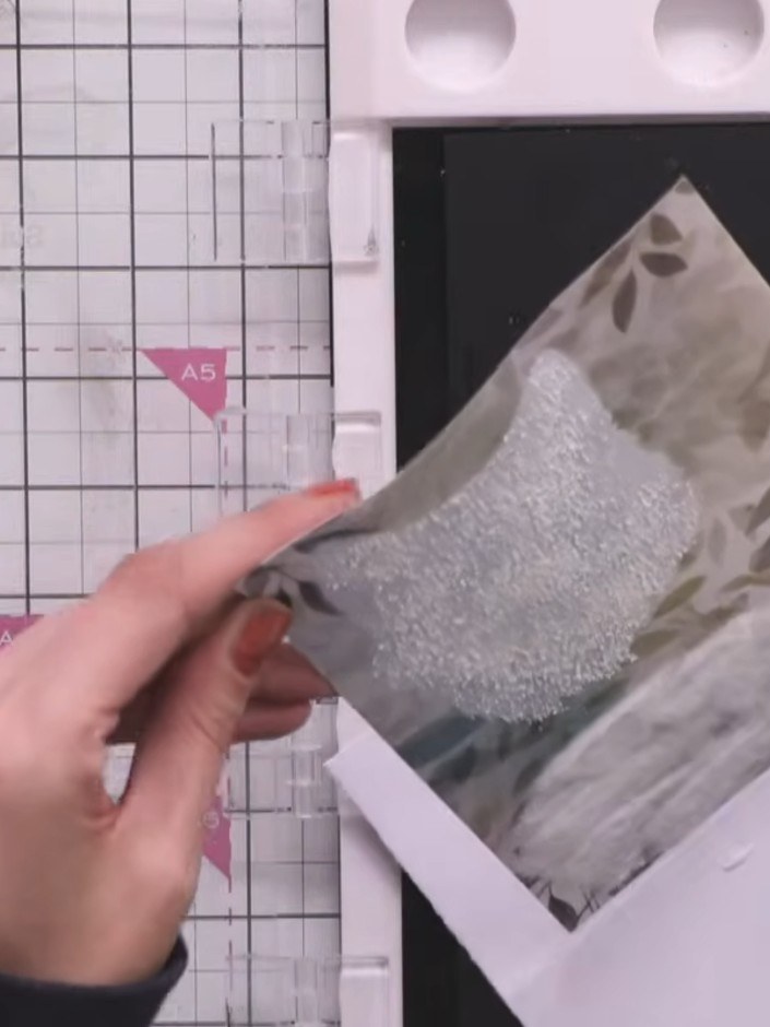 Step 6: Trim the banner tails to create pointed ends, cutting at an angle to mirror the shape on both sides of each ba