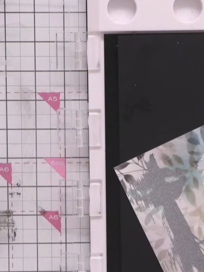 Step 7: Adhere the silver glitter banner sentiment to the centre of your card front using tape or glue. Position it ov