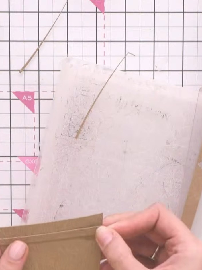 Step 2: Position layering stencil number one along the edge of your card to keep it straight. Ink through the stencil 