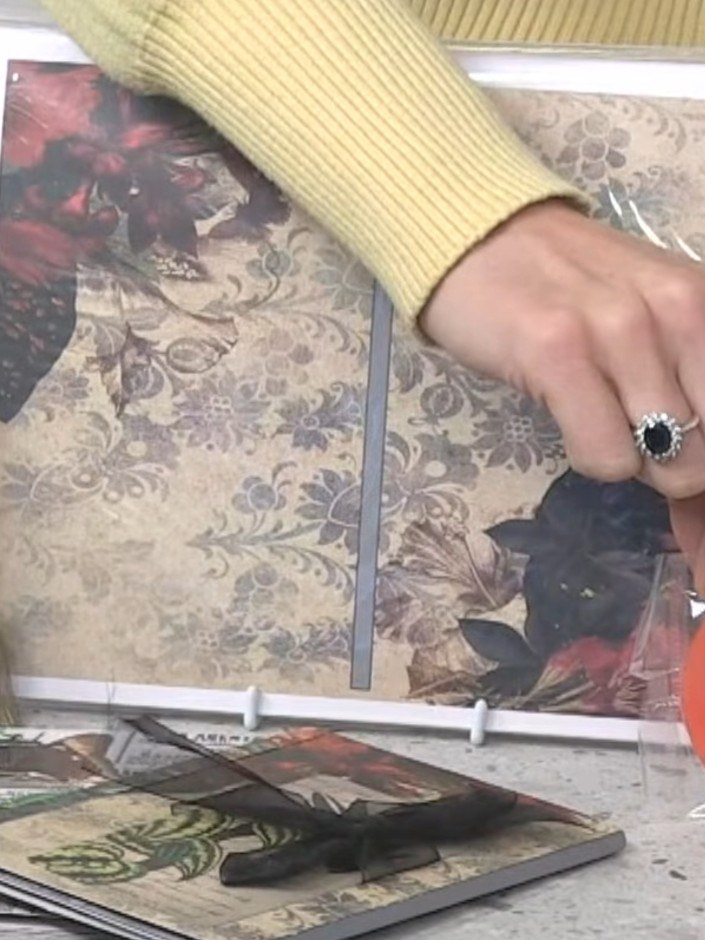 Step 3: Attach the album pages together using the included 10-metre roll of red liner tape for a permanent bond. Posit