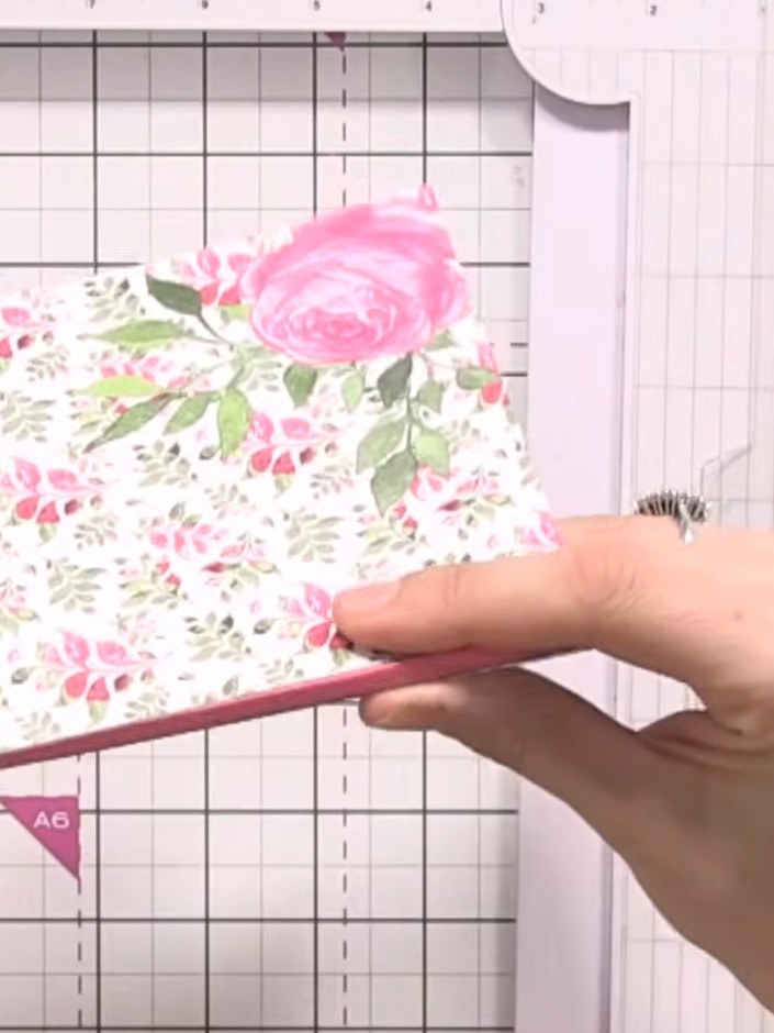 Step 2: Score along the marked lines on your patterned paper using a scoring tool to create fold lines for the album s
