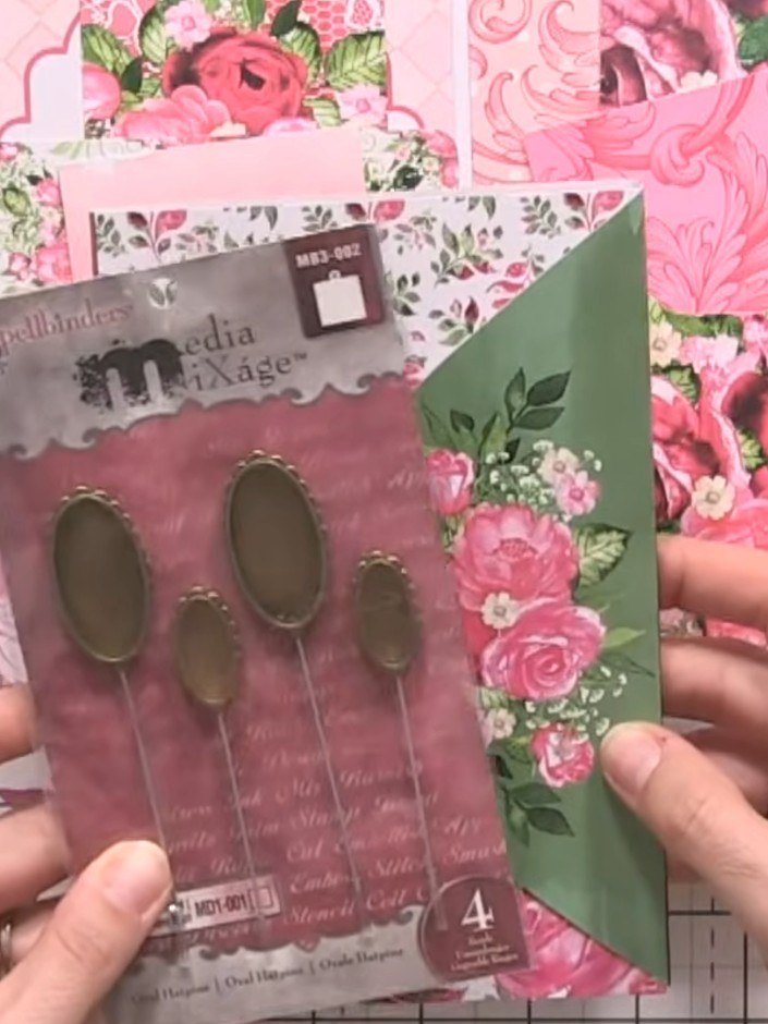 Step 9: Embellish the front and inside pages of your mini album with ribbon, flowers, decorative pins, or die-cut elem