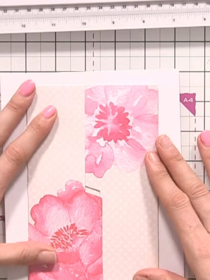 Step 6: Add decorative embellishments to your card. You can place floral toppers on the front of the card blank or use