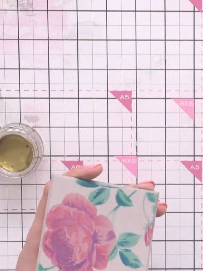 Step 7: Apply gold finger wax to the edges and corners of the coaster by dipping your finger into the wax and tapping 