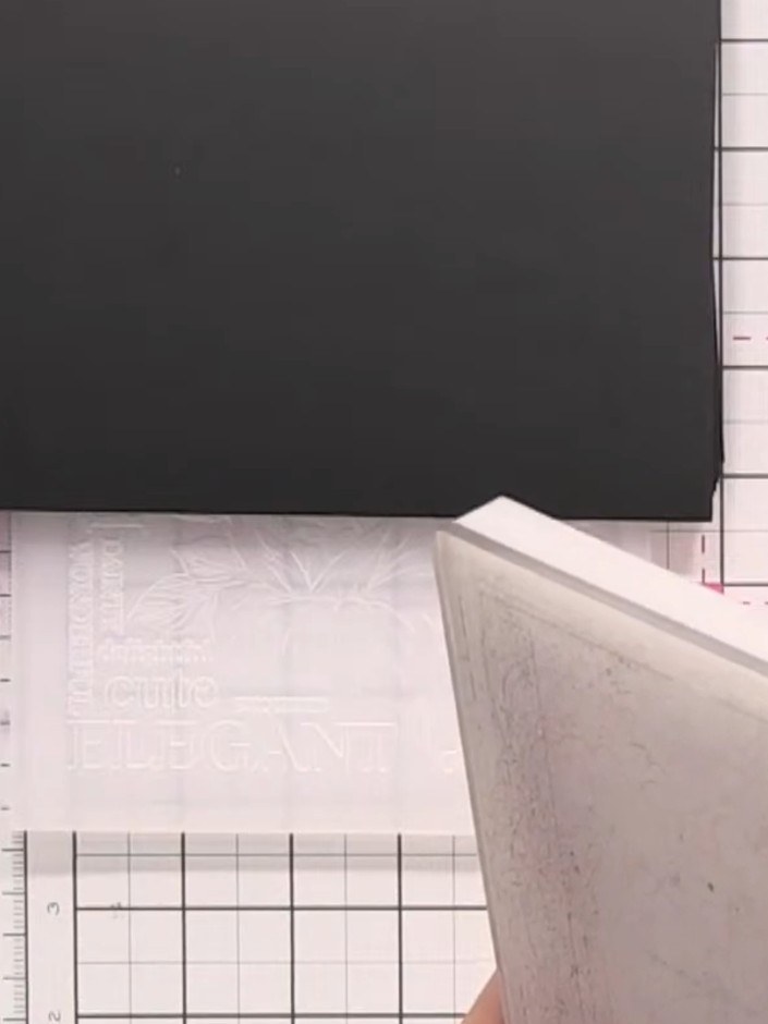 Step 2: Place the embossed card panel into the die-cutting machine with the embossing folder. Run the card through the