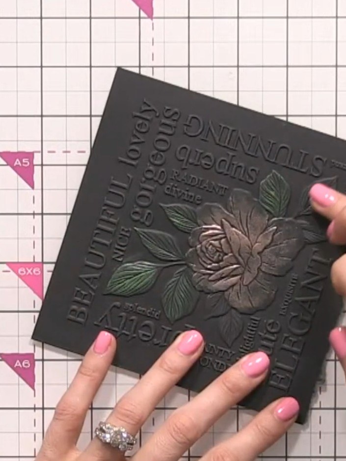 Step 6: Blend the pink and green gilding waxes together where they meet on the embossed rose design to create a gradie