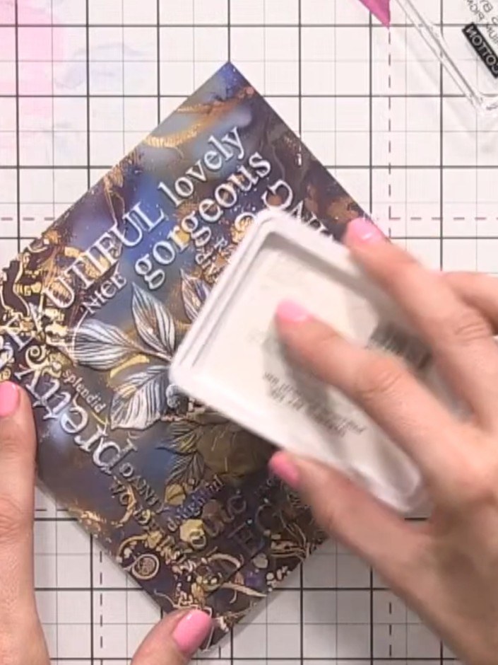 Step 7: Apply white wax over the gold areas using a blending tool or your finger to create a more blended, dual-tone f