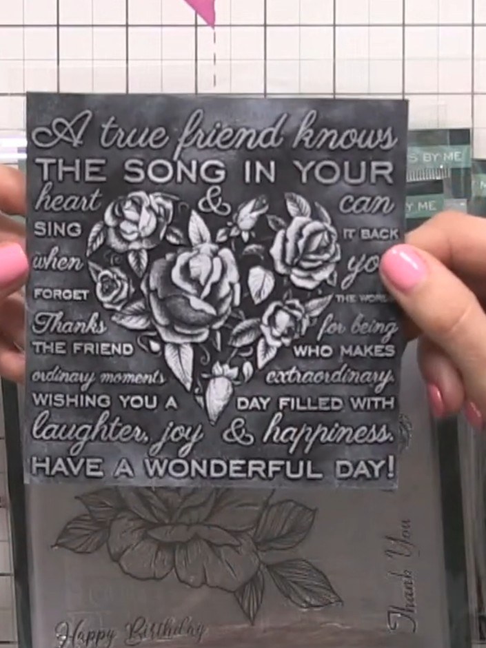 Step 3: Tap the white ink pad repeatedly over the embossed heart design to create a crisp stamped effect. Use a dabbin