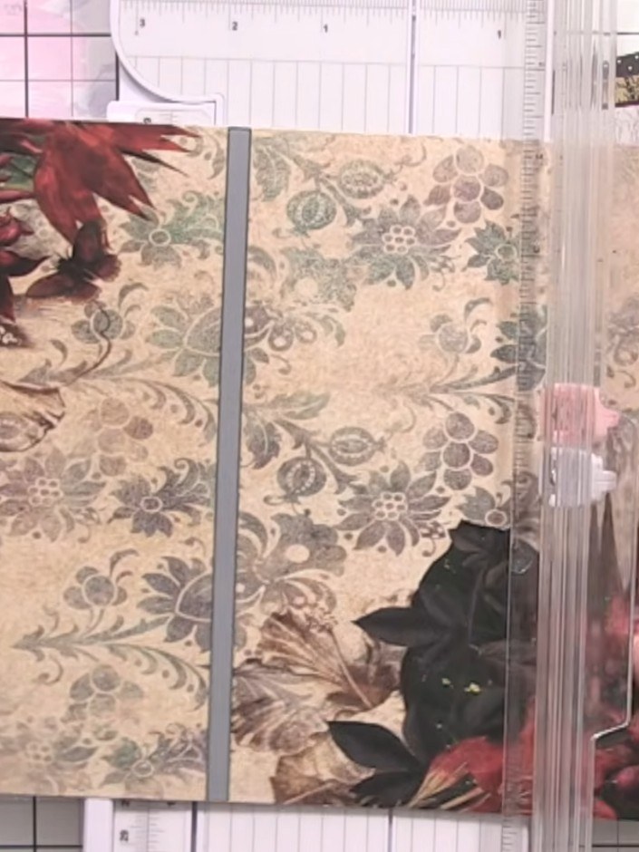 Step 1: Select your front cover piece from the pre-cut kit. Place it on your scoreboard and score along the spine line
