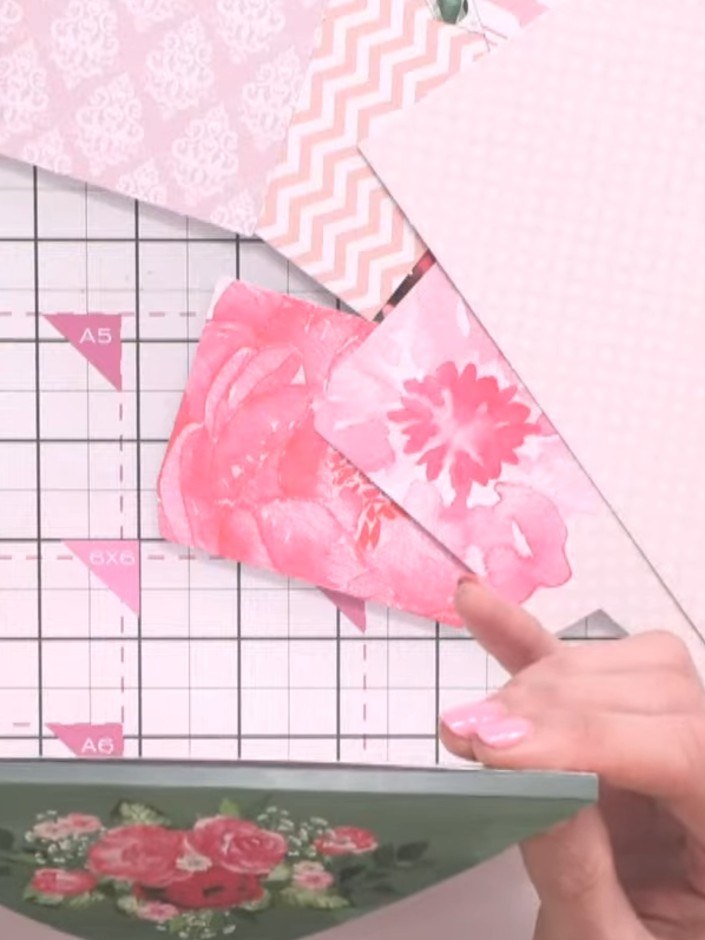 Step 5: Arrange and glue the pocket pieces onto the inner pages of your album, positioning them at different heights t