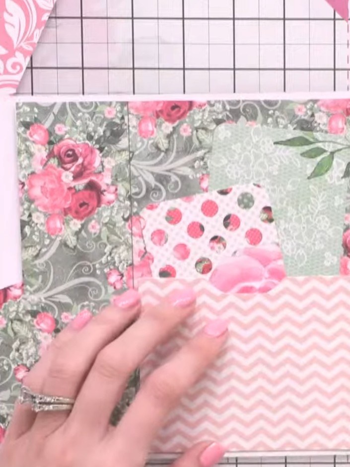Step 7: Decorate the pocket fronts by adding matted layers with pink chevron and polka dot papers. Embellish with deco