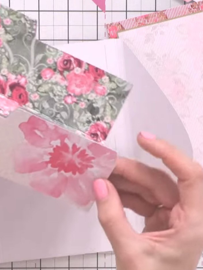 Step 2: Position the first decorative pocket piece near the top of your page. Apply glue along the bottom edge only to