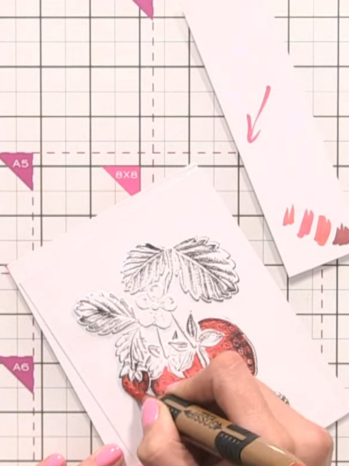 Step 6: Using the medium red marker (R13), add shading to the strawberries to create dimension. Consider your light so