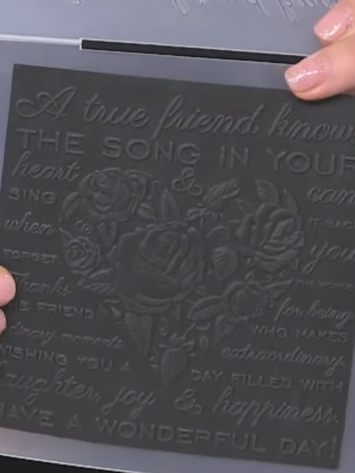Step 4: Swipe the white ink pad across the black embossed card to highlight the raised words and tree design. Use ligh