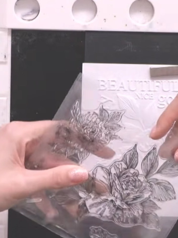 Step 3: Use your finger or a blending brush to gently soften any harsh lines around the edges of the stamped floral de