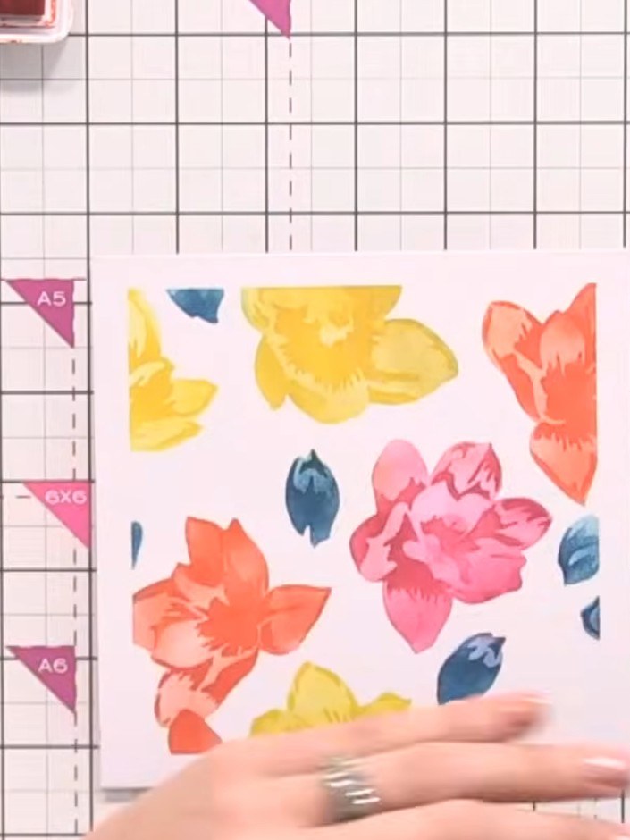Step 4: Position the third stencil over your card and apply colour lightly using the ink pads. This stencil adds textu