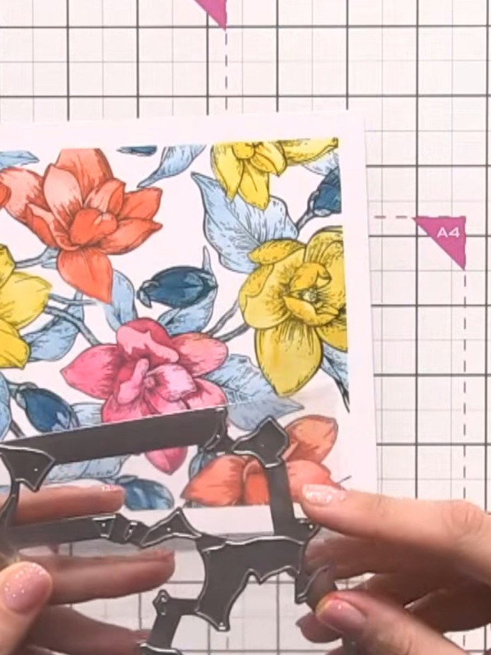 Step 6: Place the magnolia die over the stamped floral design and run through your die-cutting machine to cut out the 
