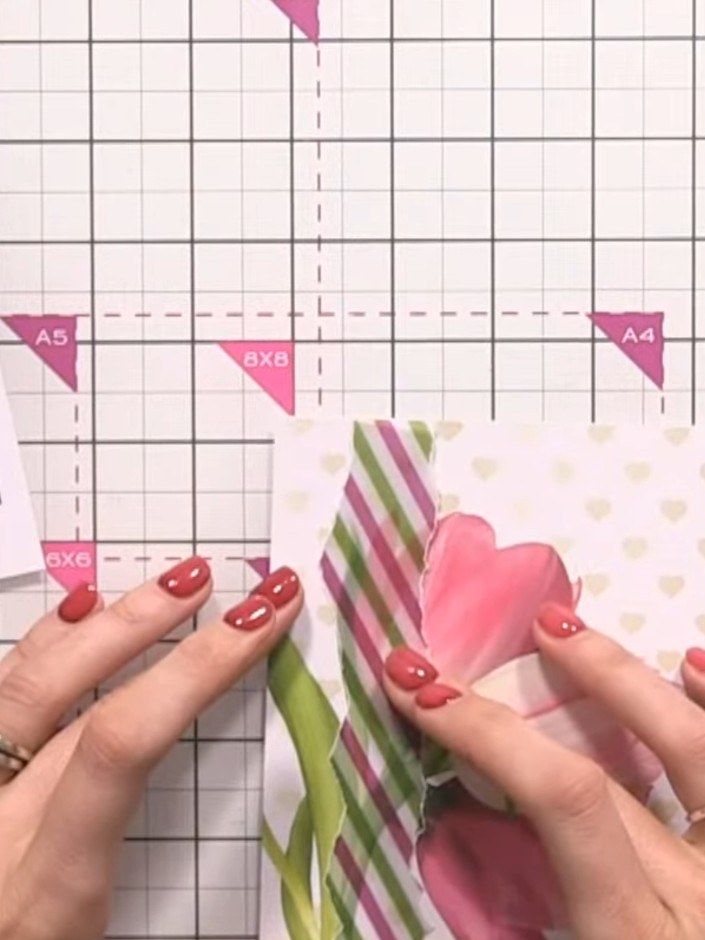 Step 5: Cut a section of the striped vellum and adhere it vertically across the card front, positioning it over the tu