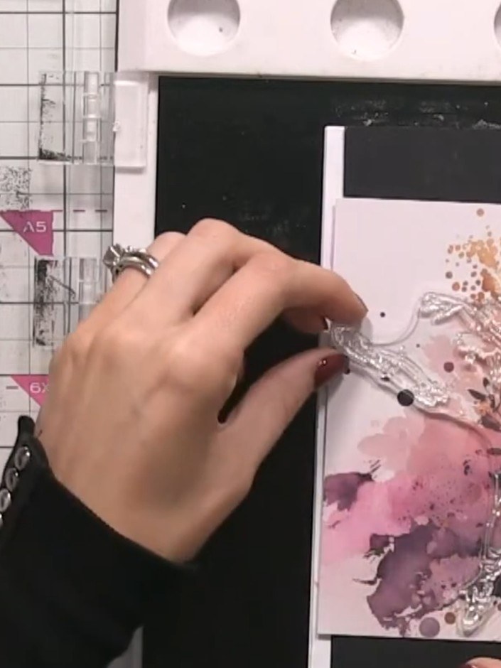 Step 3: Stamp the coloured dress portion of the stamp onto the card, carefully lining it up with the ballerina girl us