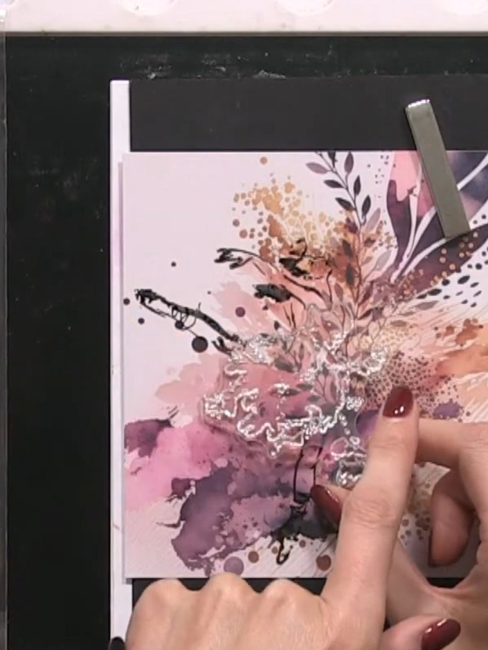 Step 4: Apply watercolour inks in coral, pink, orange and teal to the dress area of the ballerina image, spotting the 