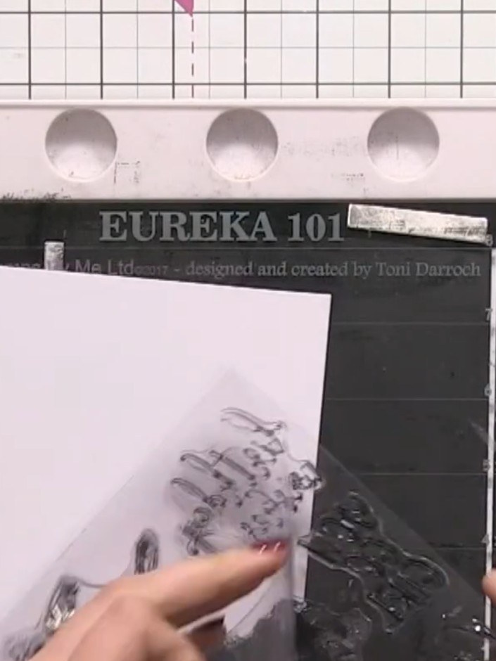 Step 7: Stamp a sentiment such as 'Live Your Dreams' in white ink onto the card using a stamp from the Little Ballerin
