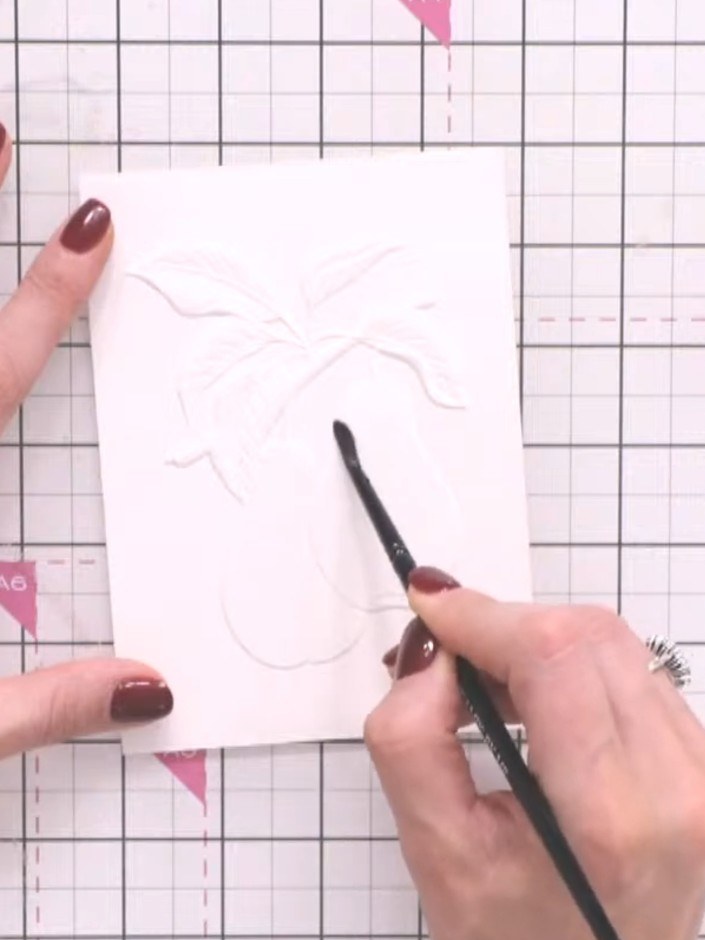 Step 4: Using a clean, damp brush, soften any harsh colour lines by blending the edges of the watercolour on your pear