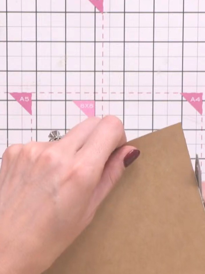Step 9: Mount the finished painted and stamped card panel onto a craft-coloured card blank using double-sided tape. Po