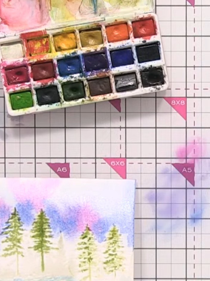 Step 10: Once the watercolour is fully dry, optionally add white speckles using white acrylic paint mixed with water to