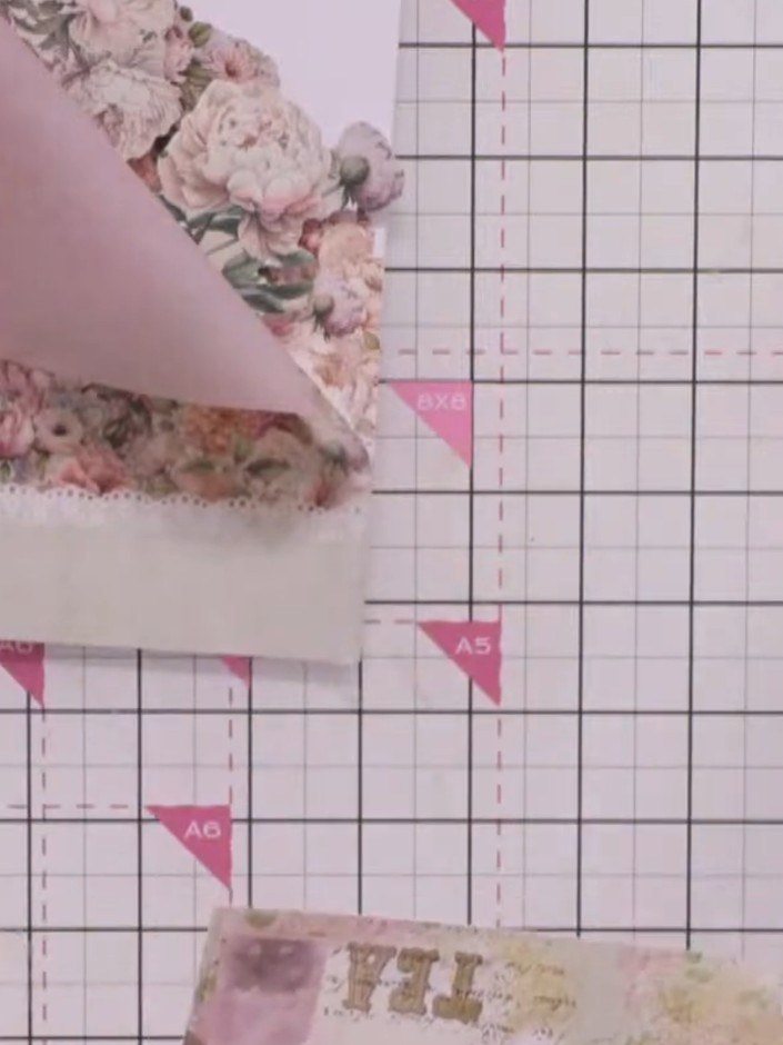 Step 8: Cut a narrow strip of coordinating paper to create a border panel. This will hide any tape and construction ma