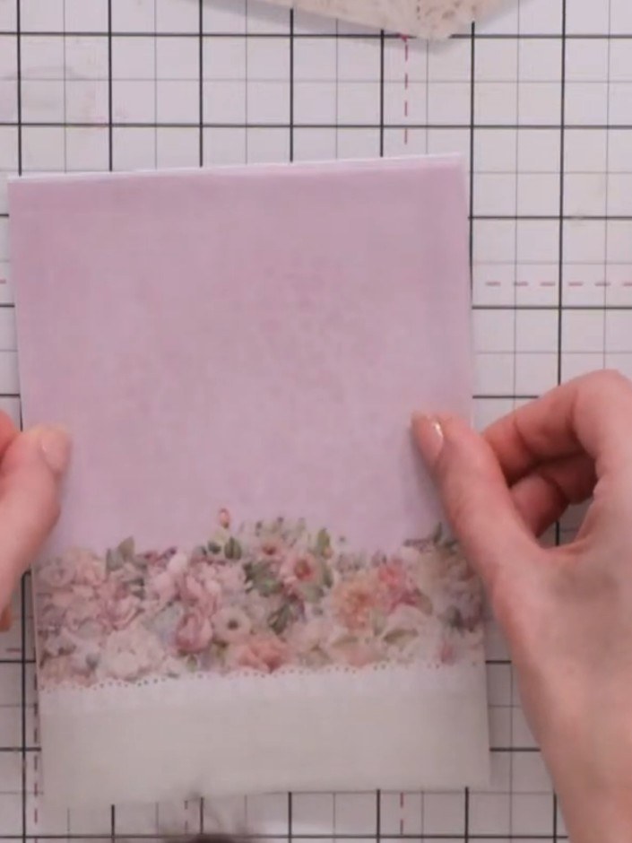 Step 9: Adhere the completed frame to your card base using tape around the outer edges. Position the frame so the deco