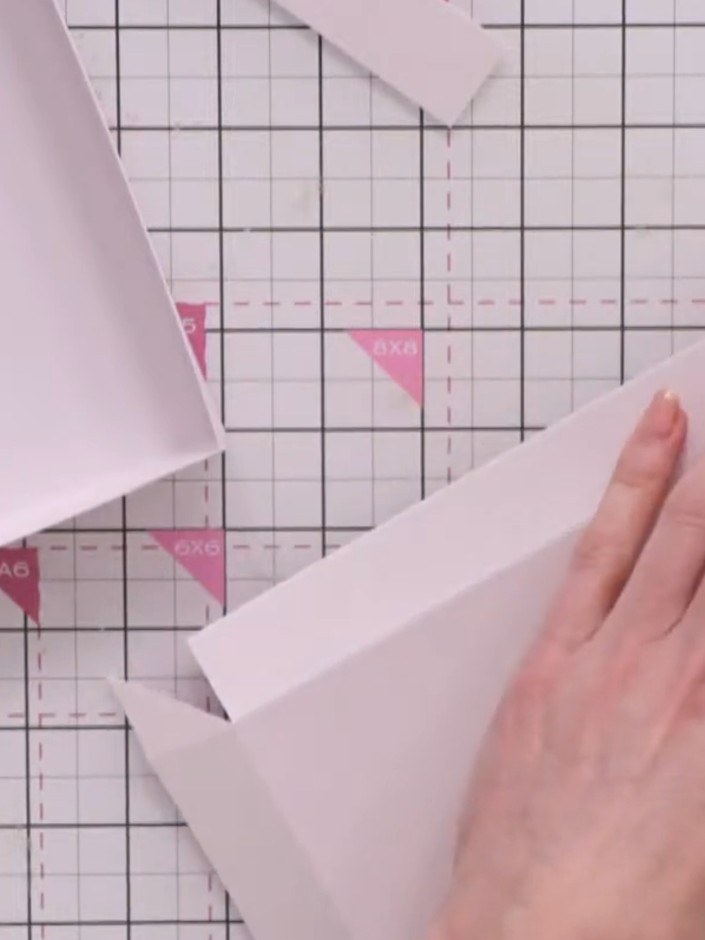 Step 11: Repeat the folding and assembly process with the second piece of card to create the matching lid for your box.
