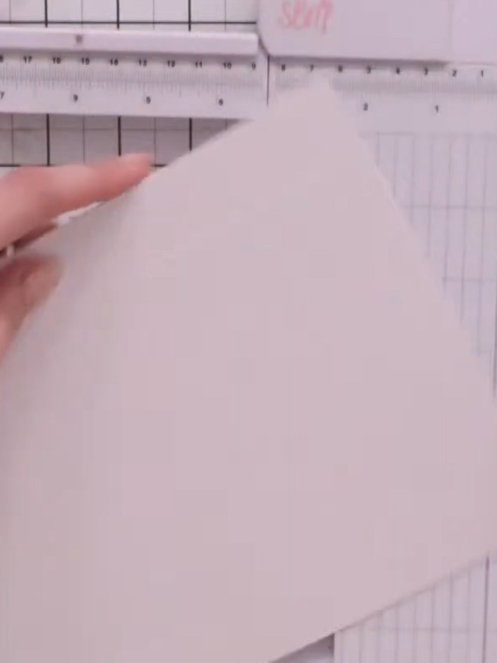 Step 7: Score all four sides of both card pieces at 1-inch intervals using your scoring tool and ruler. Ensure the sco