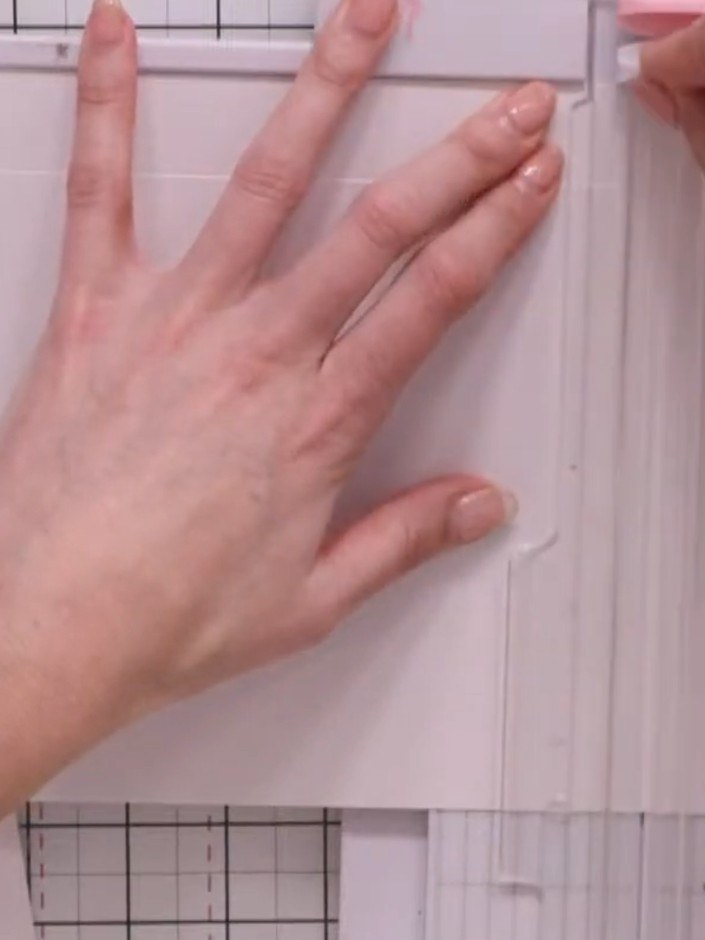 Step 8: Cut diagonally into the corners at the scored lines, stopping at the inner corner point where the score lines 
