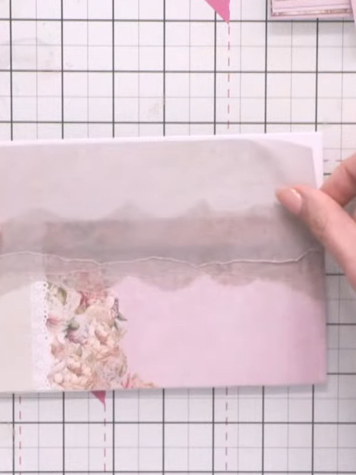 Step 4: Place a third vellum strip across the top of the card panel to complete the layered vellum detail. Ensure the 