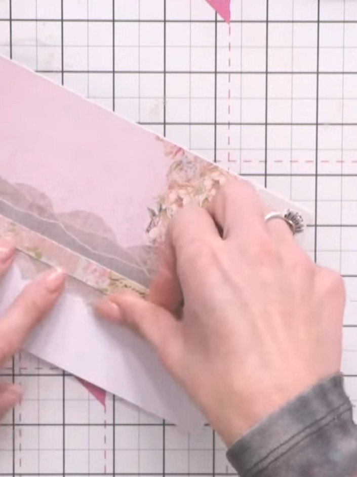 Step 7: Apply foam pads to the back of the top vellum panel. Position the panel on the card base to create a raised, l