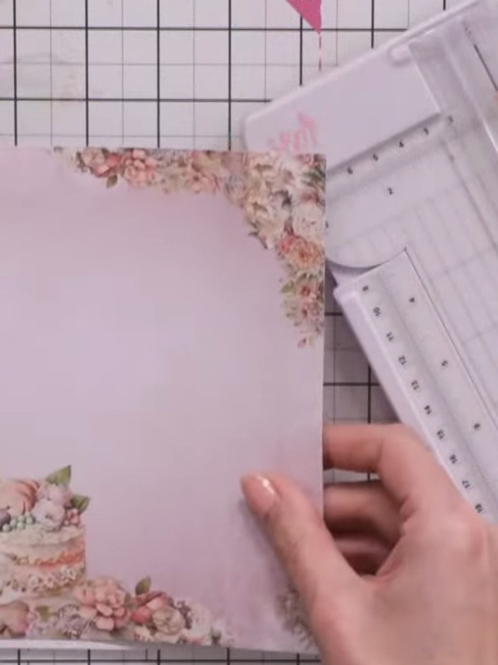 Step 1: Select a patterned paper with decorative floral detail along one side. Place it on your cutting mat and mark w