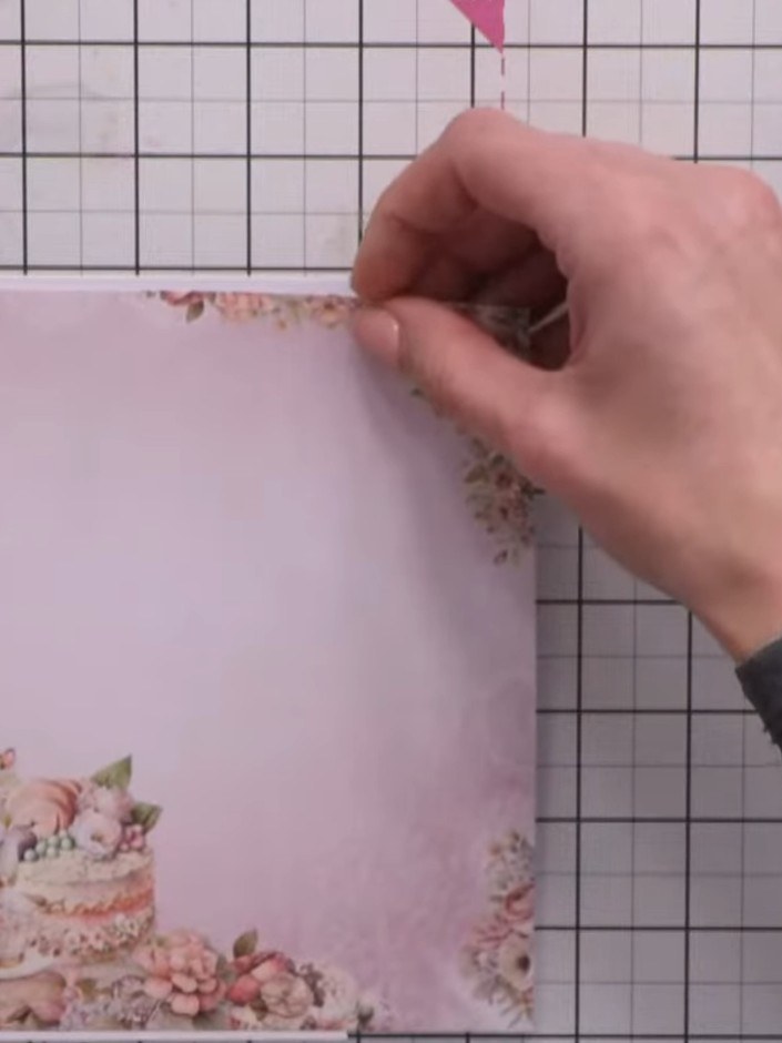 Step 2: Mark where you want your aperture window to be on the card front, following the decorative detail of the flora