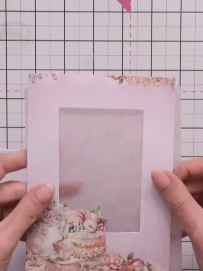 Step 5: Select a light-coloured vellum sheet and cut it to size to fit behind your aperture window on the card front.