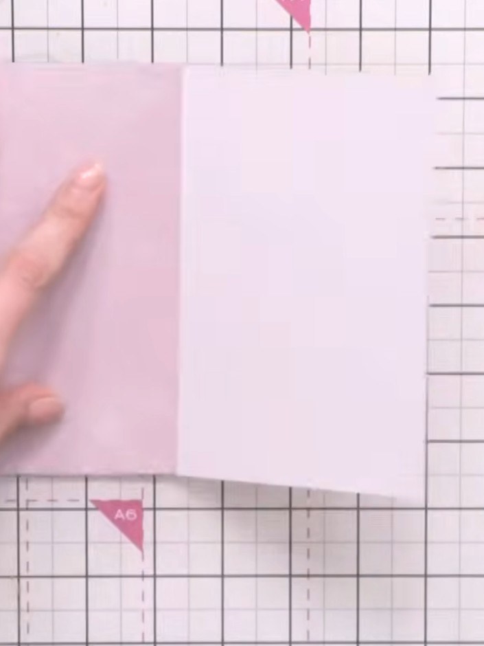 Step 3: Trim small slivers from the folded edges of the vellum panels to prevent bulking when they fold over one anoth