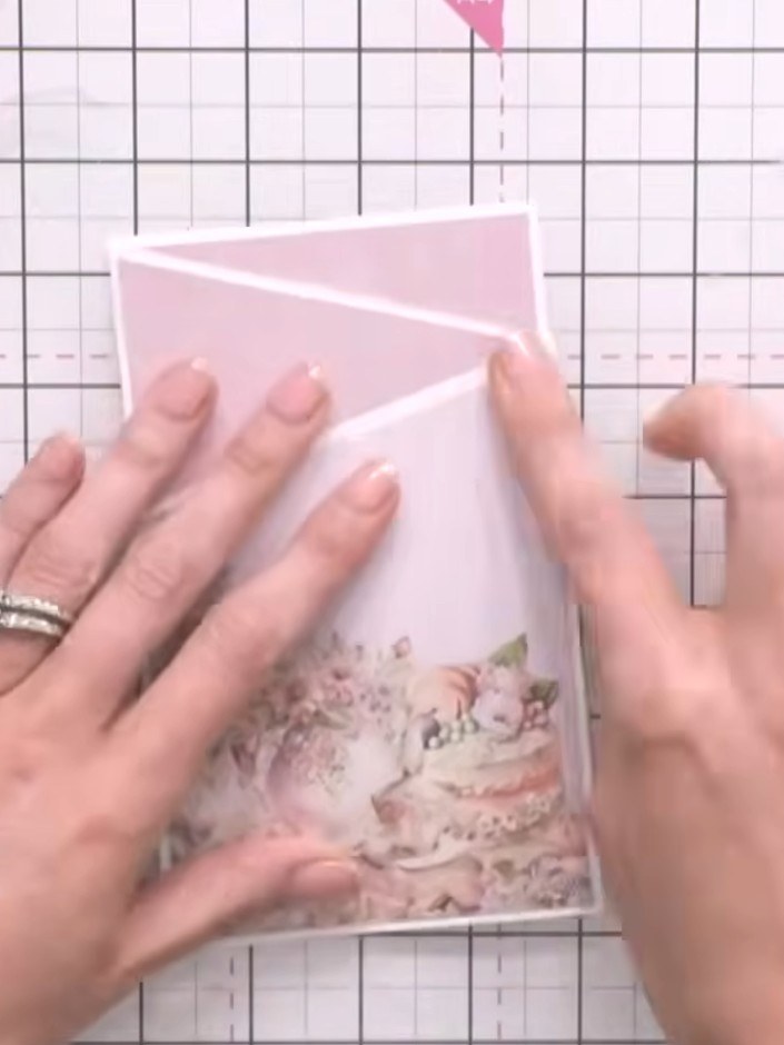 Step 10: Add decorative embellishments from the pack to the inside flap of the card to create an interesting panel. Lay